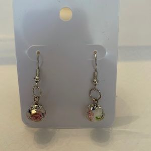 Handmade earrings. Glass floral bead. $15